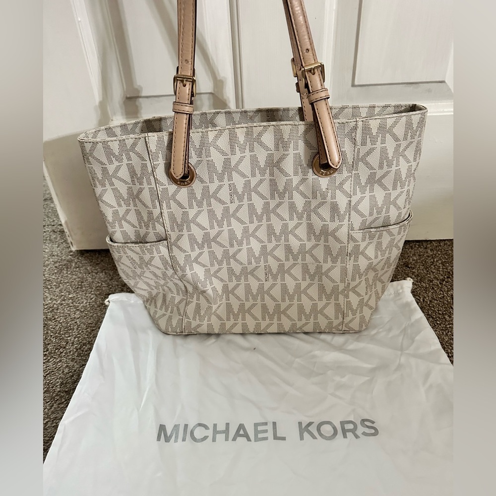 used Michael Kors purse in fair condition